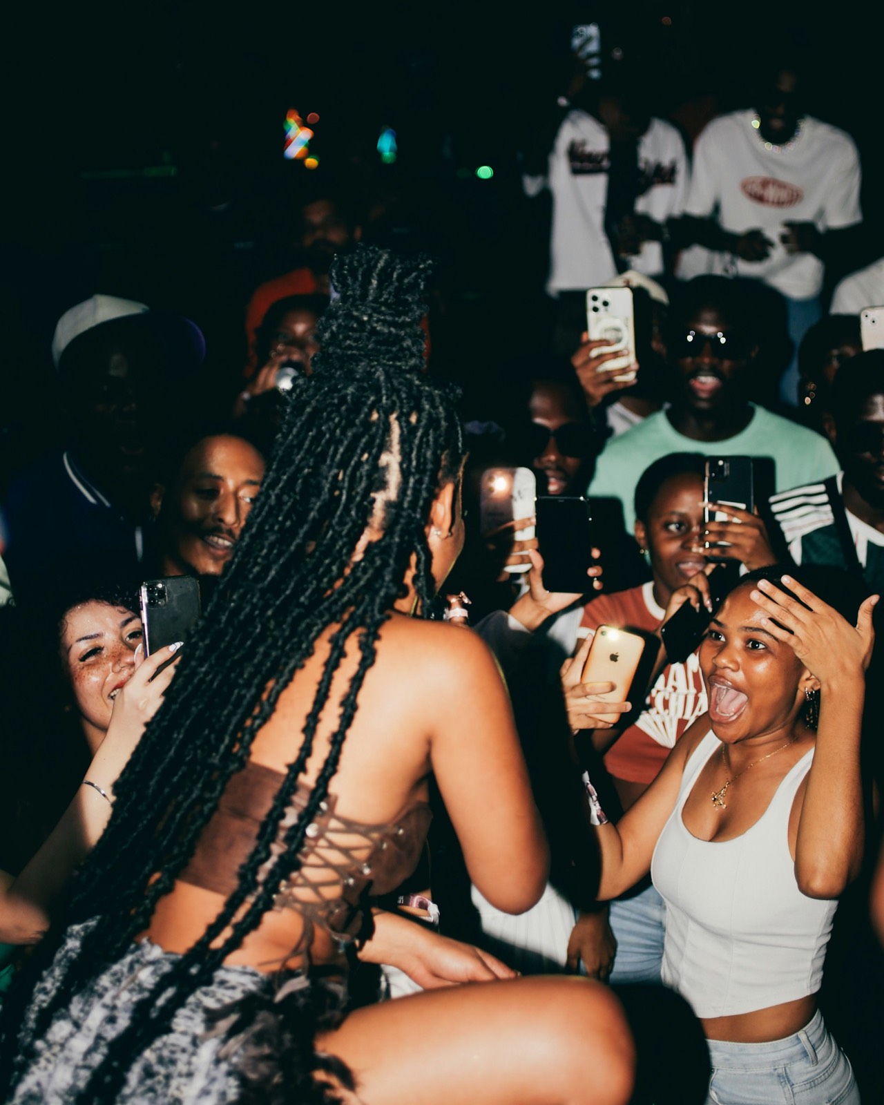 Young crowd partying at a show