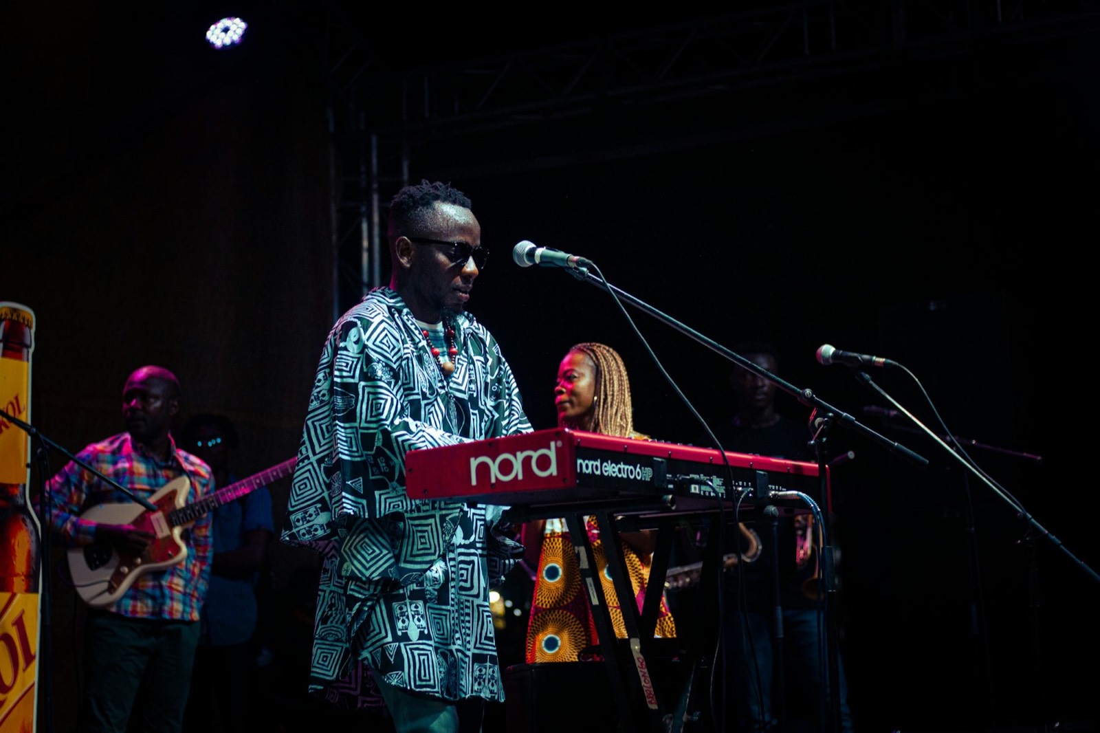 Musician playing keyboards on stage