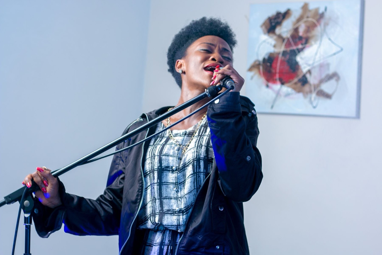 Singer performing into a microphone